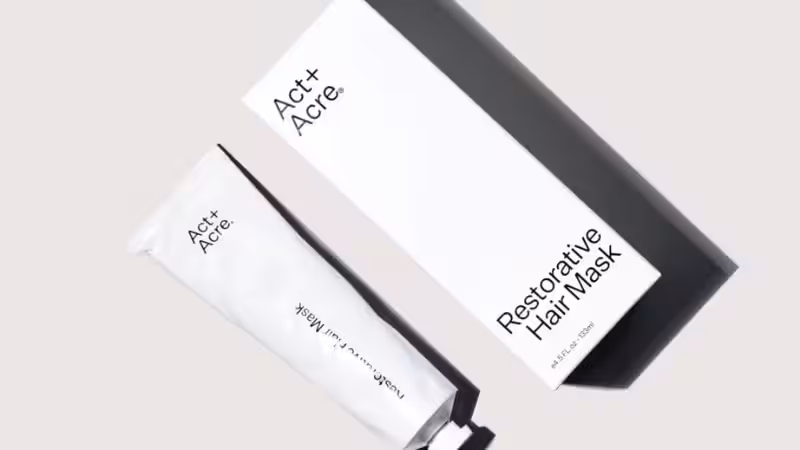 white minimalist product box of hand cream