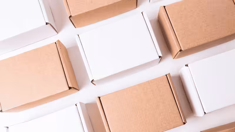 white and brown kraft paper boxes