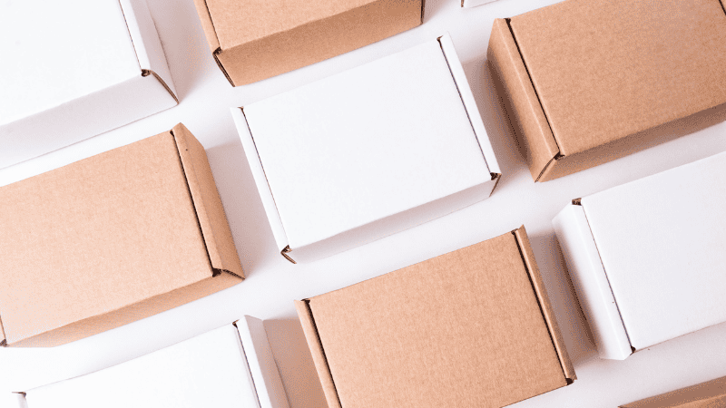white and brown kraft paper boxes