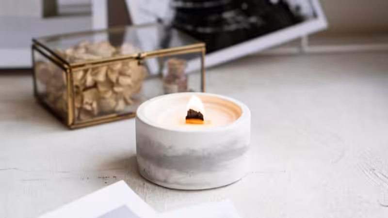 candle in a ceramic container