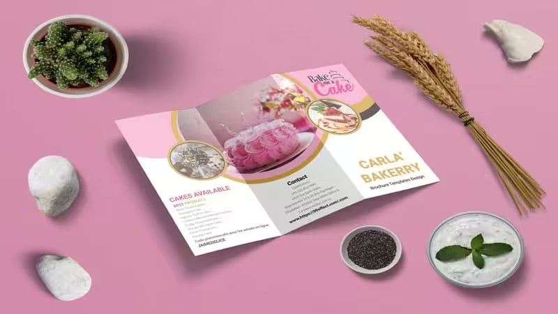 Eco-friendly brochure mockup for Carla's Bakery, displayed with sustainable materials like wheat, natural decor, and eco-friendly elements.