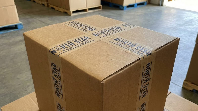 a shipping box with custom brand packing tape