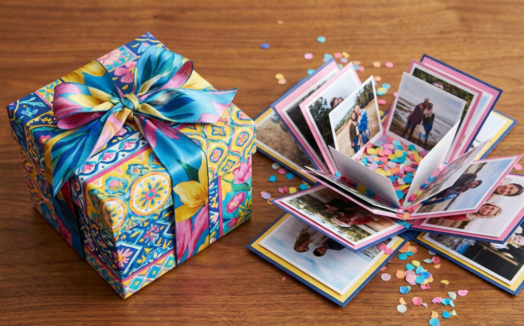 Visually appealing, vibrant boho gift box for women, paired with a colorful pop-up photo album filled with confetti and memories.