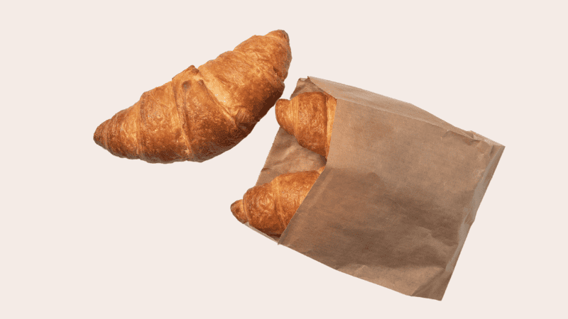 paper food bag within croissant