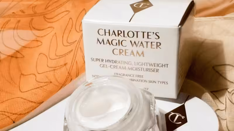 Luxury face cream in glass jar with cardboard box