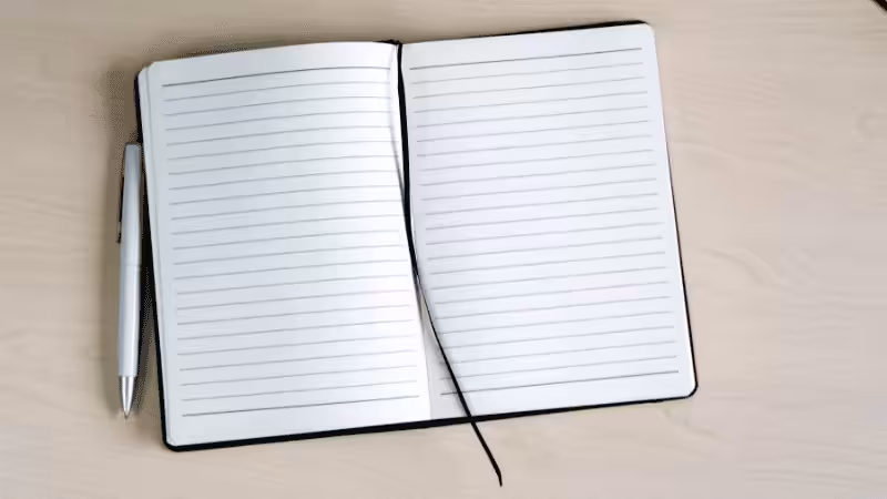 a notebook and a pen