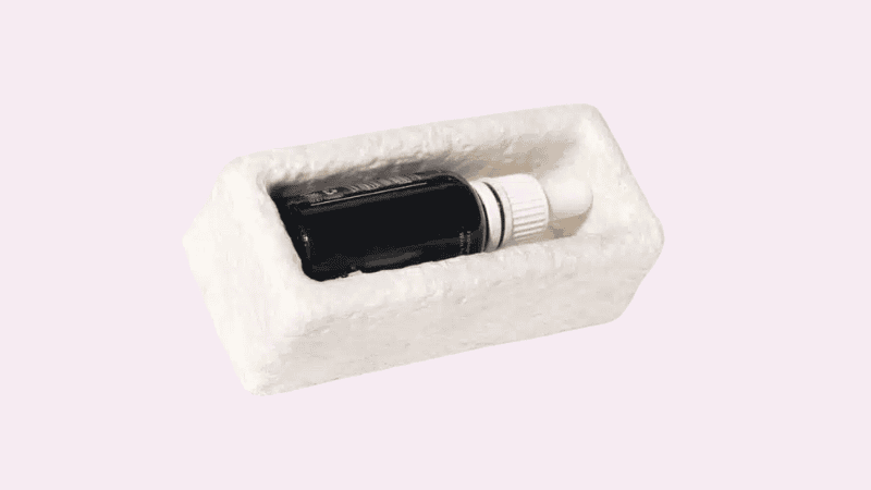 a skincare product putting in a mushroom packaging