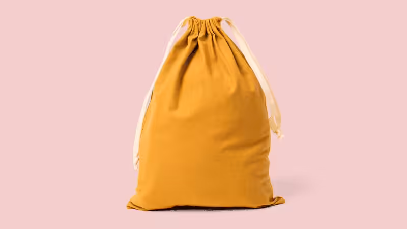 Yellow cotton pouch with white drawstrings