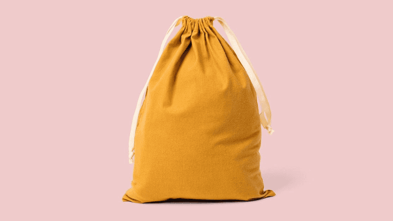 Yellow cotton pouch with white drawstrings