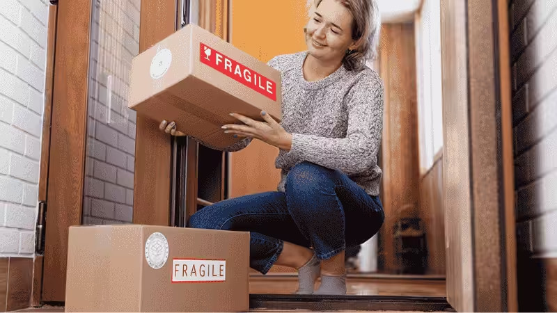 Women receiving her fragile packages