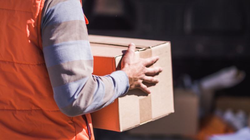 a man is moving a packaging