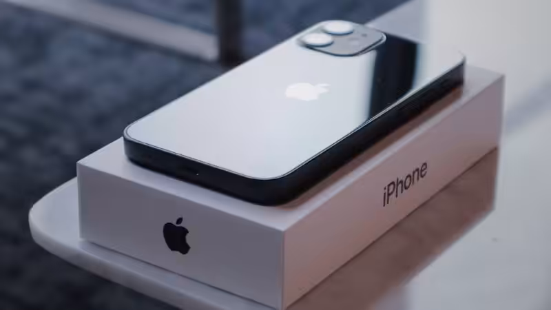 Apple phone and box representing simplicity in design