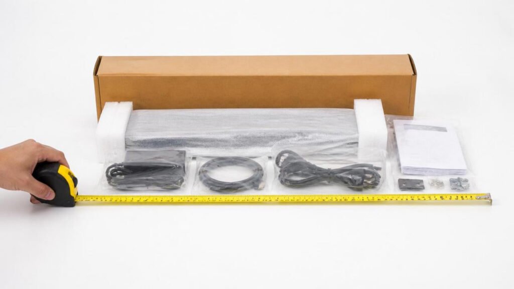 Tape measure measuring long item and matched shipping outer box, accurate shipping box size parameter confirmation