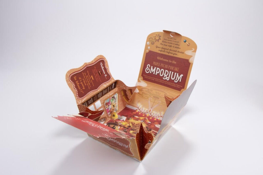 Opened vintage style custom blind box printed with Maple Pecan Pancake Emporium illustration