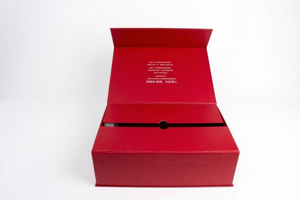 Custom bright red magnetic flap rigid gift box with printed text inside lid
