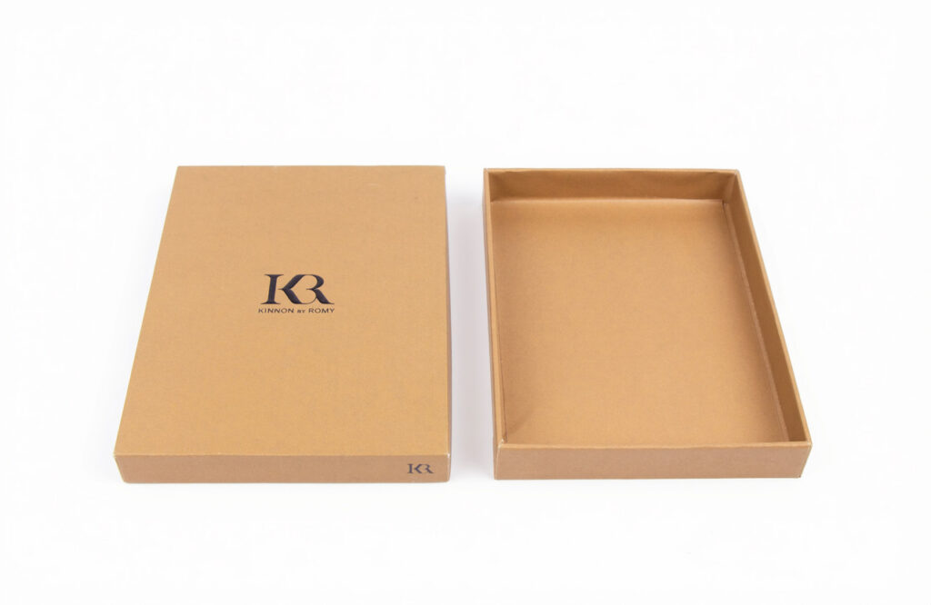 Custom kraft paper rigid two-piece box with embossed brand logo, lid and base separated